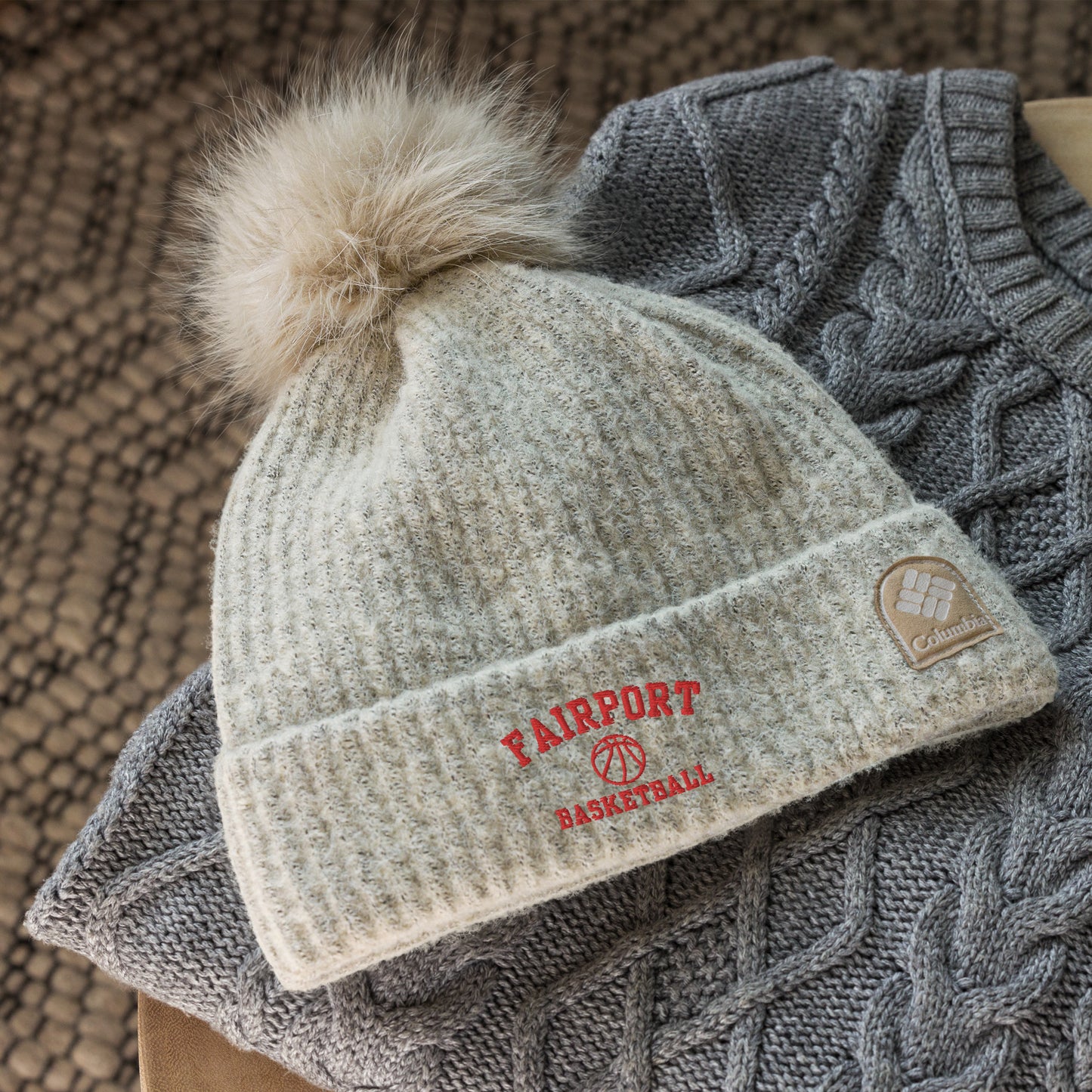 Fairport Basketball Columbia pom-pom beanie